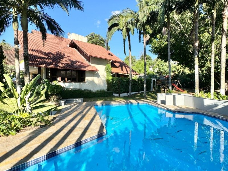 Casa em Condomínio à venda com 206m², 3 quartos, 1 suíte, 3 vagas no bairro Rondônia em Novo Hamburgo